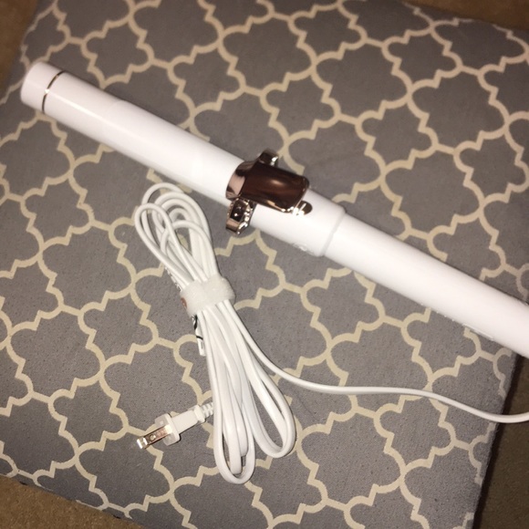 T3 self twirling curling iron